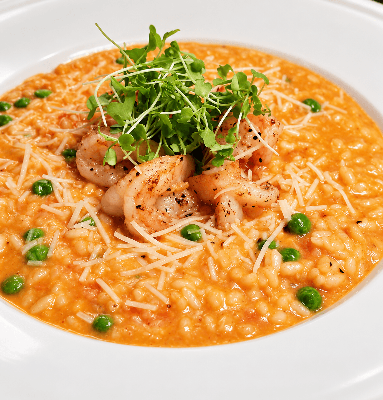 Shrimp risotto with fresh herbs, photographed from above