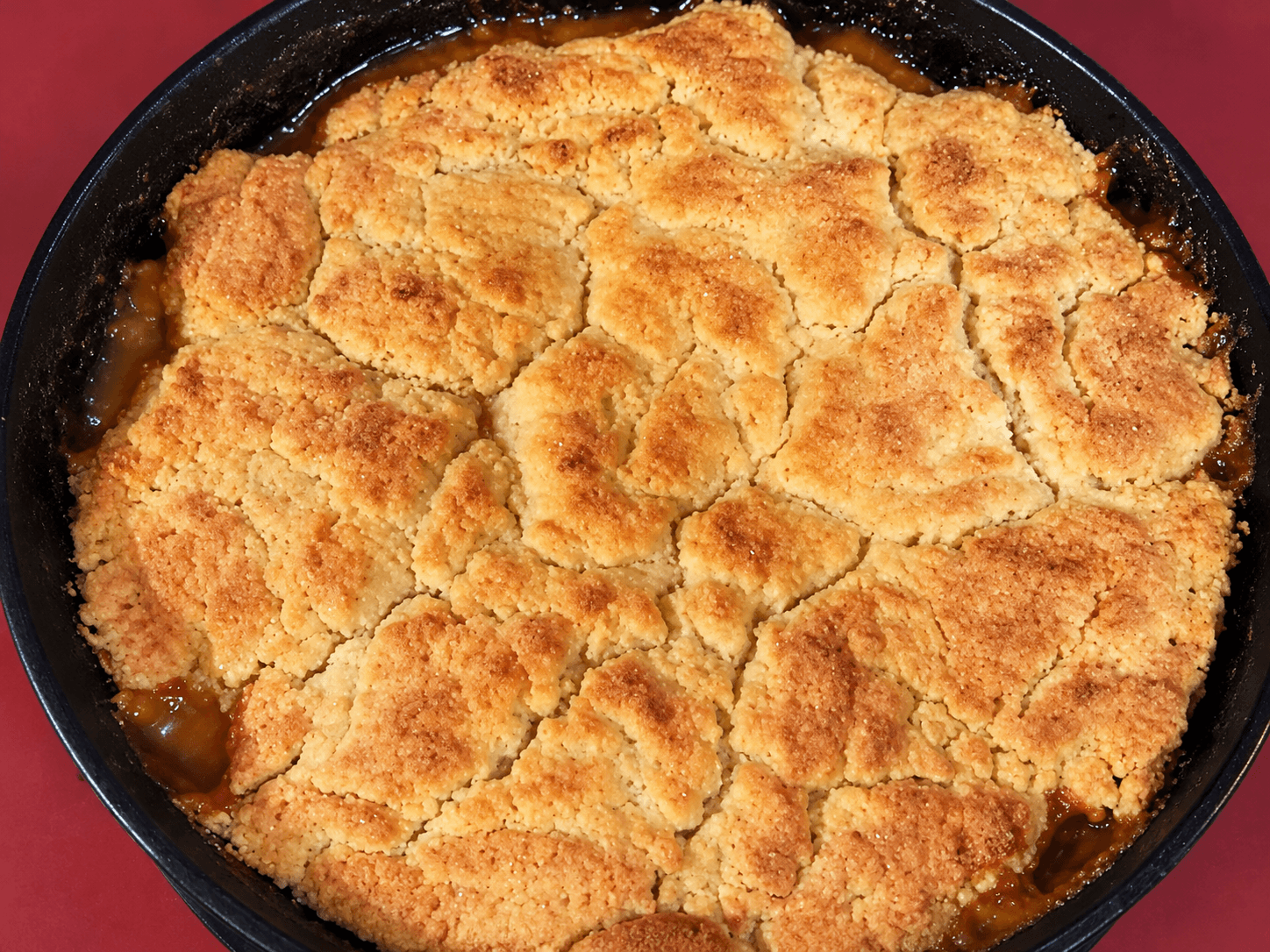 Peach Cobbler baked in a skillet
